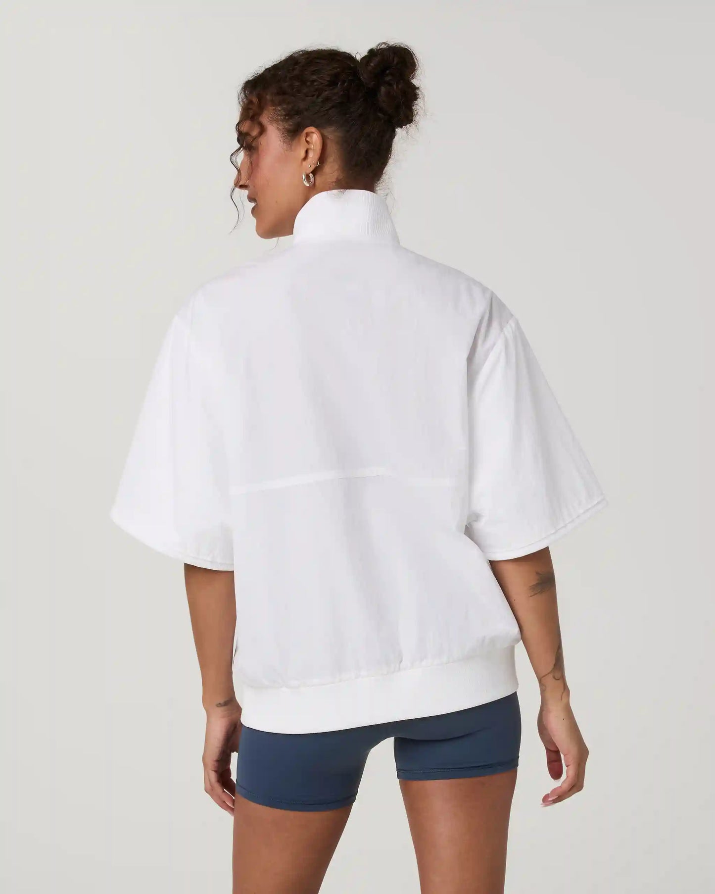 Retrograde Short Sleeve Half Zip Jacket